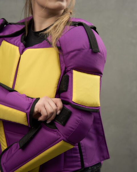 Segmented vest with shoulder protection and biceps