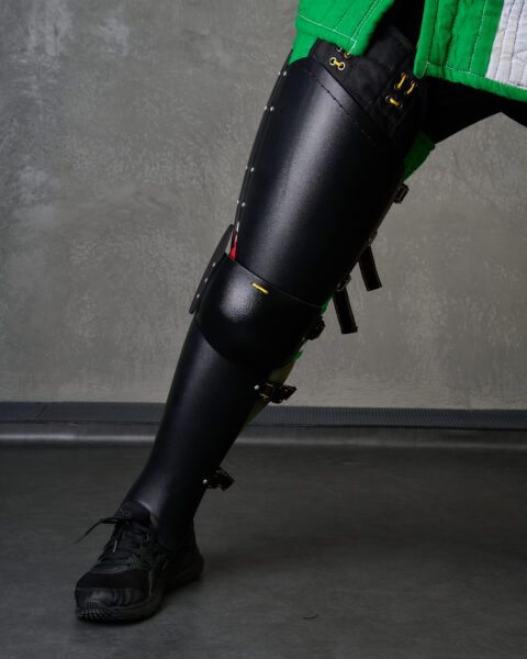 Plastic shins protection with side plate